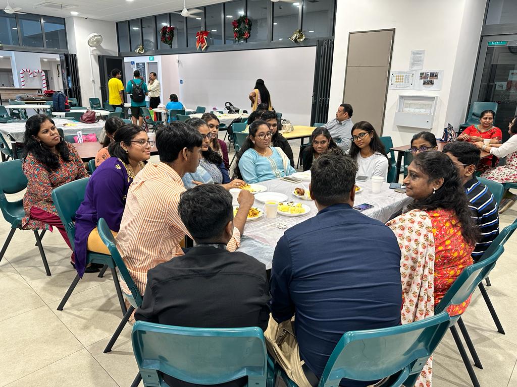 Young adults of the SJSM Tamil congregation enjoying a fellowship lunch together.
